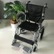 Light portable folding push wheelchair for caregiver use